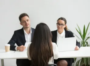 A two-person client panel interviewing a specialist